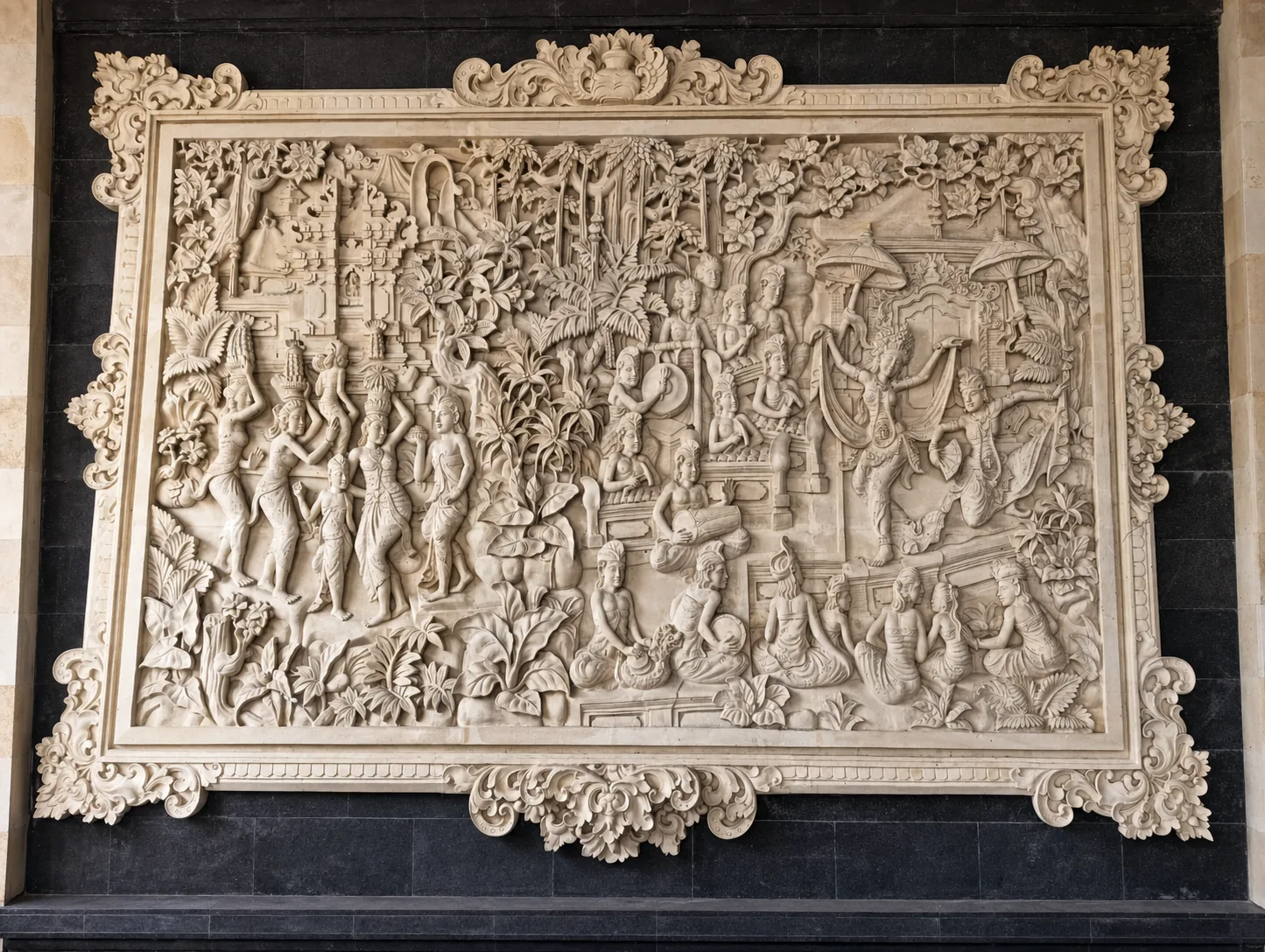 Framed narrative stone relief with figures and tropical foliage